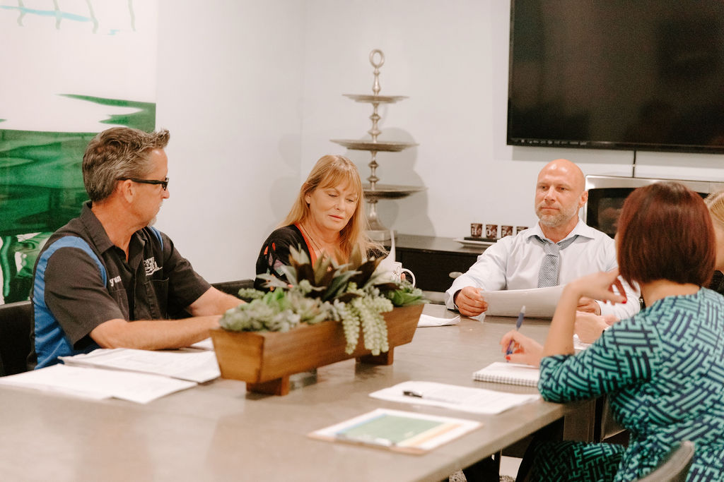 addiction and mental health professionals discussing the family program