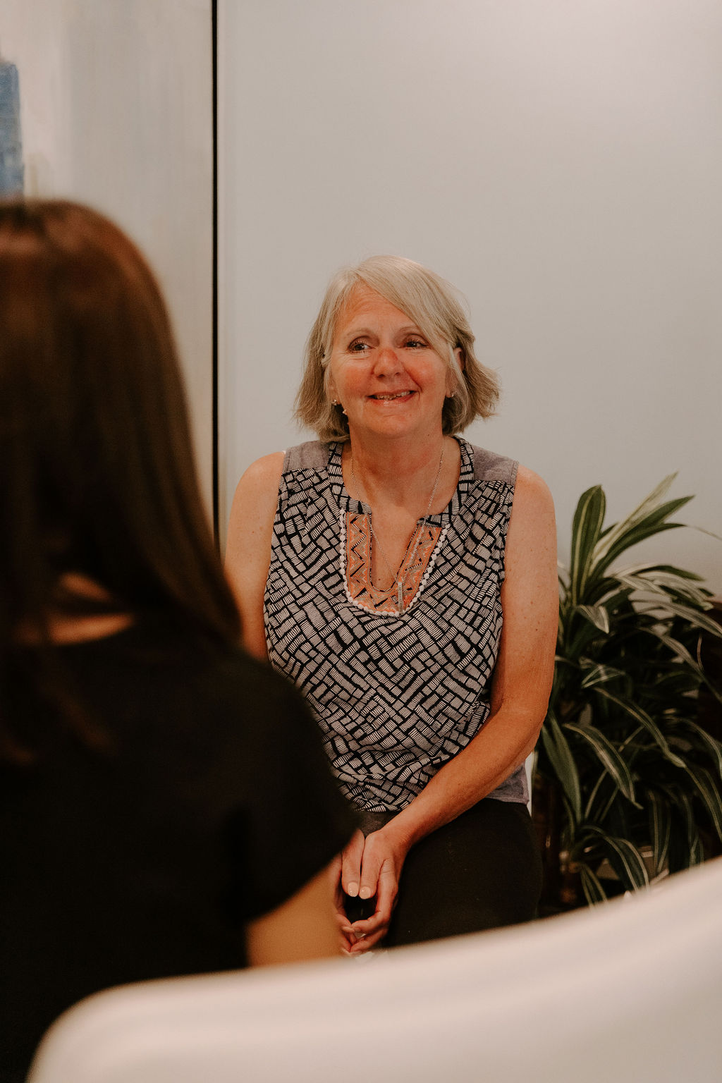 older woman in addiction recovery group