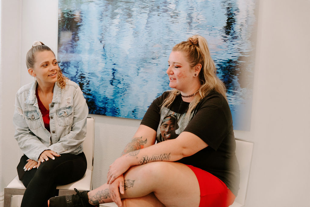 two females talking to each other during addiction recovery